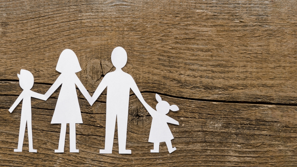 top-view-paper-family-composition-wooden-background-with-copy-space.jpg